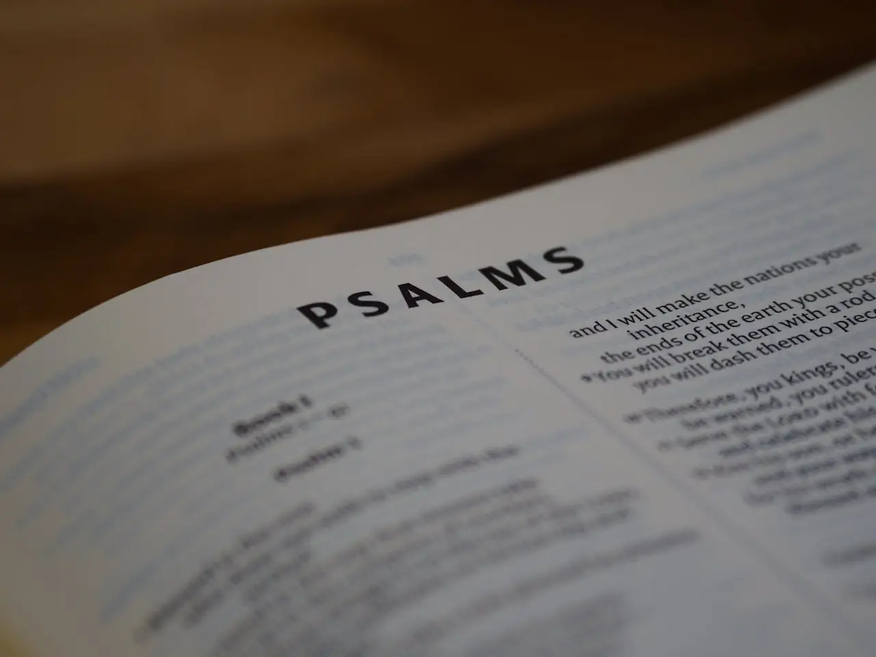 pexels photo 11506026 A detailed close-up of a Psalms page from the Bible with text focus.